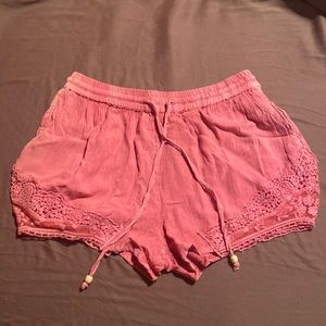 Cute never worn pinkish orange small beach shorts.